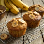 fresh 4 ingredient banana muffins on cooling rack