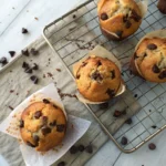 banana bread chocolate chip muffins cooling on a rack