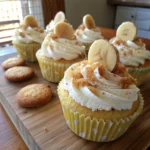 banana pudding cupcakes filled with vanilla pudding and whipped cream