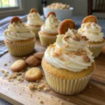banana pudding cupcakes filled with vanilla pudding and whipped cream