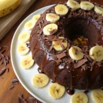 Chocolate Banana Pudding Cake with banana slices and chocolate
