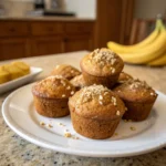 fresh-baked mini banana muffins on white plate